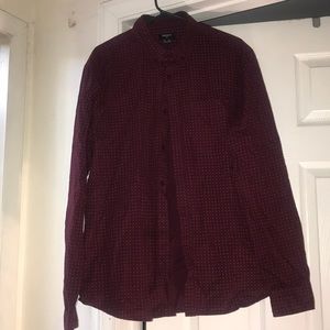 Red and white button down shirt.
